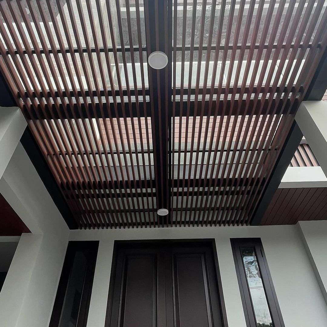 Woodium pergola over an entrance
