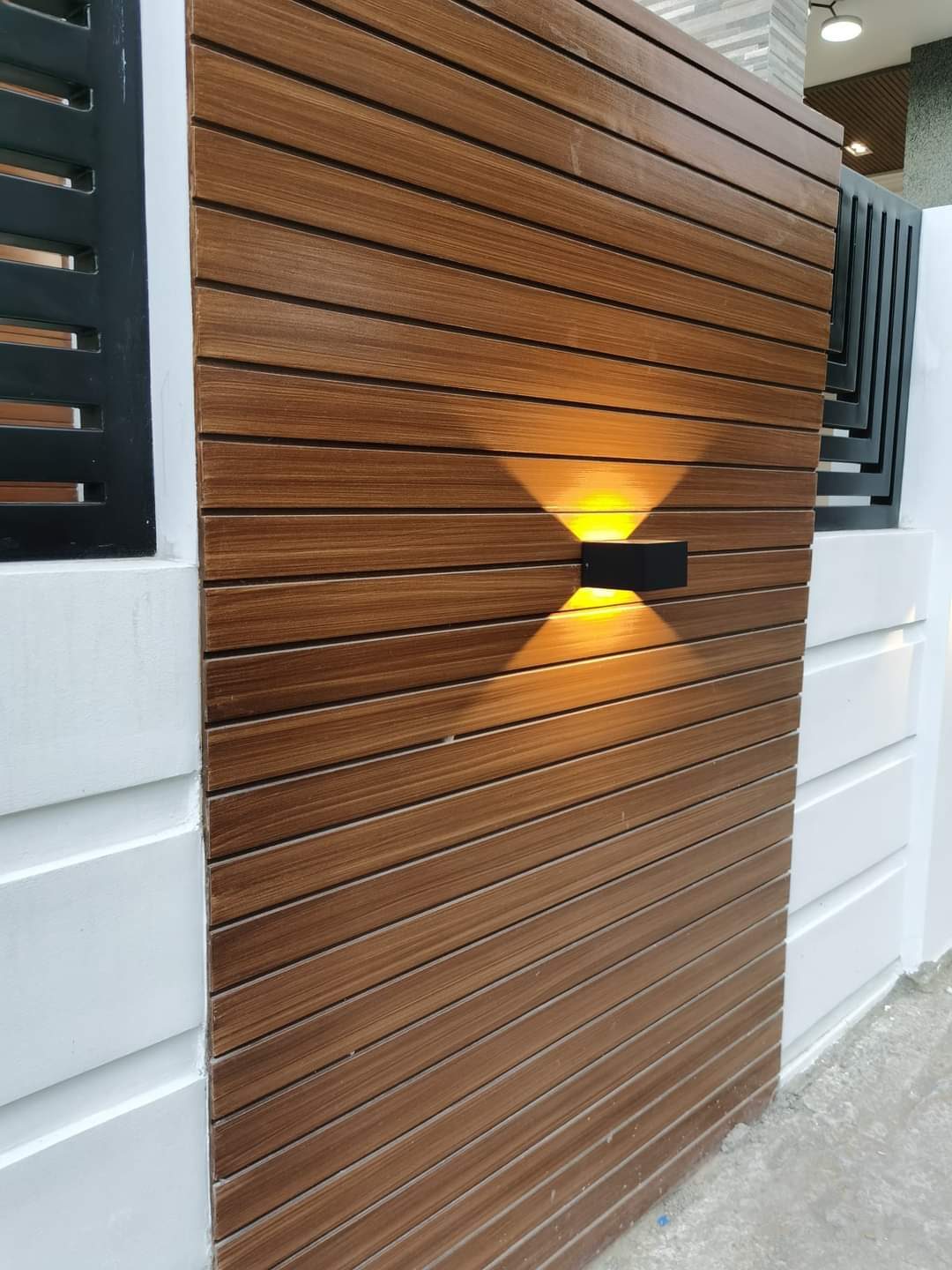 Gate finished in wood-tone Woodium