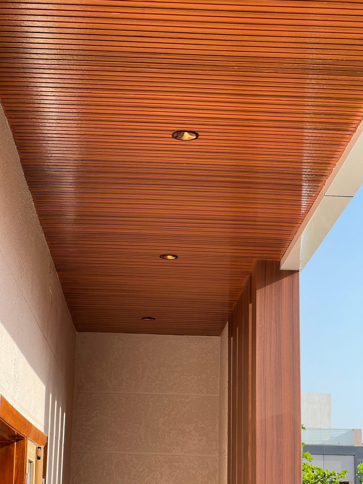 Woodium ceiling over a porch