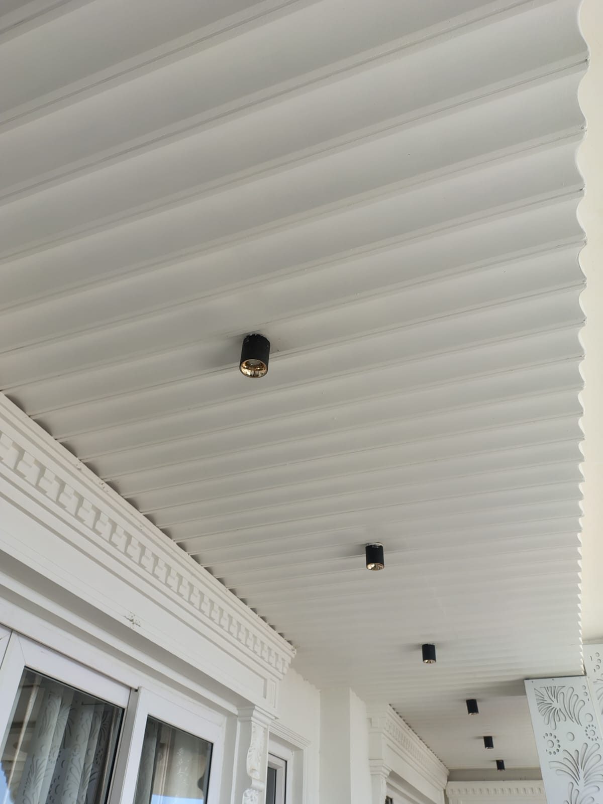 White painted Woodium balcony ceiling